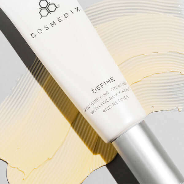 A close up of the Define tube with age defying treatment.