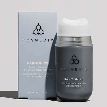 A box and bottle of Harmonize, it is a microbiome Boosting Moisturizer helps strengthen skin’s natural moisture barrier and helps protect the complexion from environmental stressors.