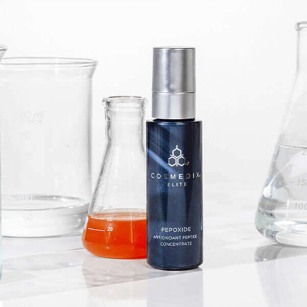 Pepoxide bottle with beakers , it has antioxidants and a powerhouse Peptide that dramatically helps improve the look of fine lines and wrinkles. 