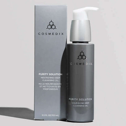 Bottle and box of Purity Solution, it is a two-in-one makeup remover and cleanser with a nutrient-rich blend of radiance-boosting oils that gently melt away dirt, oil, makeup and impurities for a hydrated, healthy-looking glow.