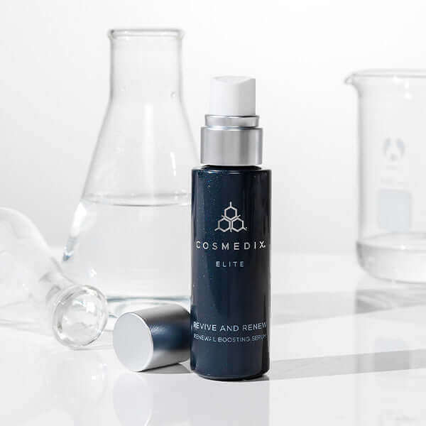 Bottle of Revive serum that helps reduce signs of aging, deeply moisturize, and help rejuvenate the look of dull, lackluster skin for a healthier-looking, radiant glow. 