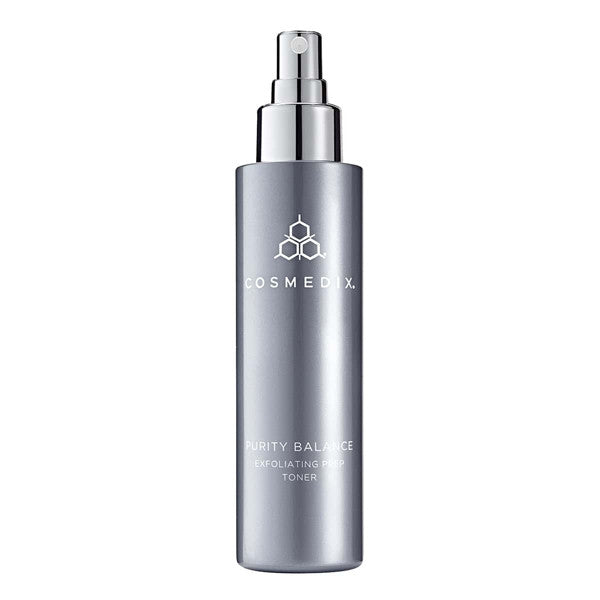 Close up of Purity Balance bottle, Purity Balance is a pore-refining toner that exfoliates and preps skin as it helps absorb excess oil and impurities for a clearer-looking complexion.