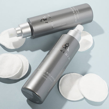 Two Purity Balance bottles on their side, it is a pore-refining toner that exfoliates and preps skin as it helps absorb excess oil and impurities for a clearer-looking complexion.